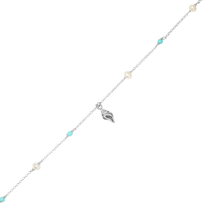 Delicate silver bracelet with silver conch charm, pearl and turquoise beads on a white background