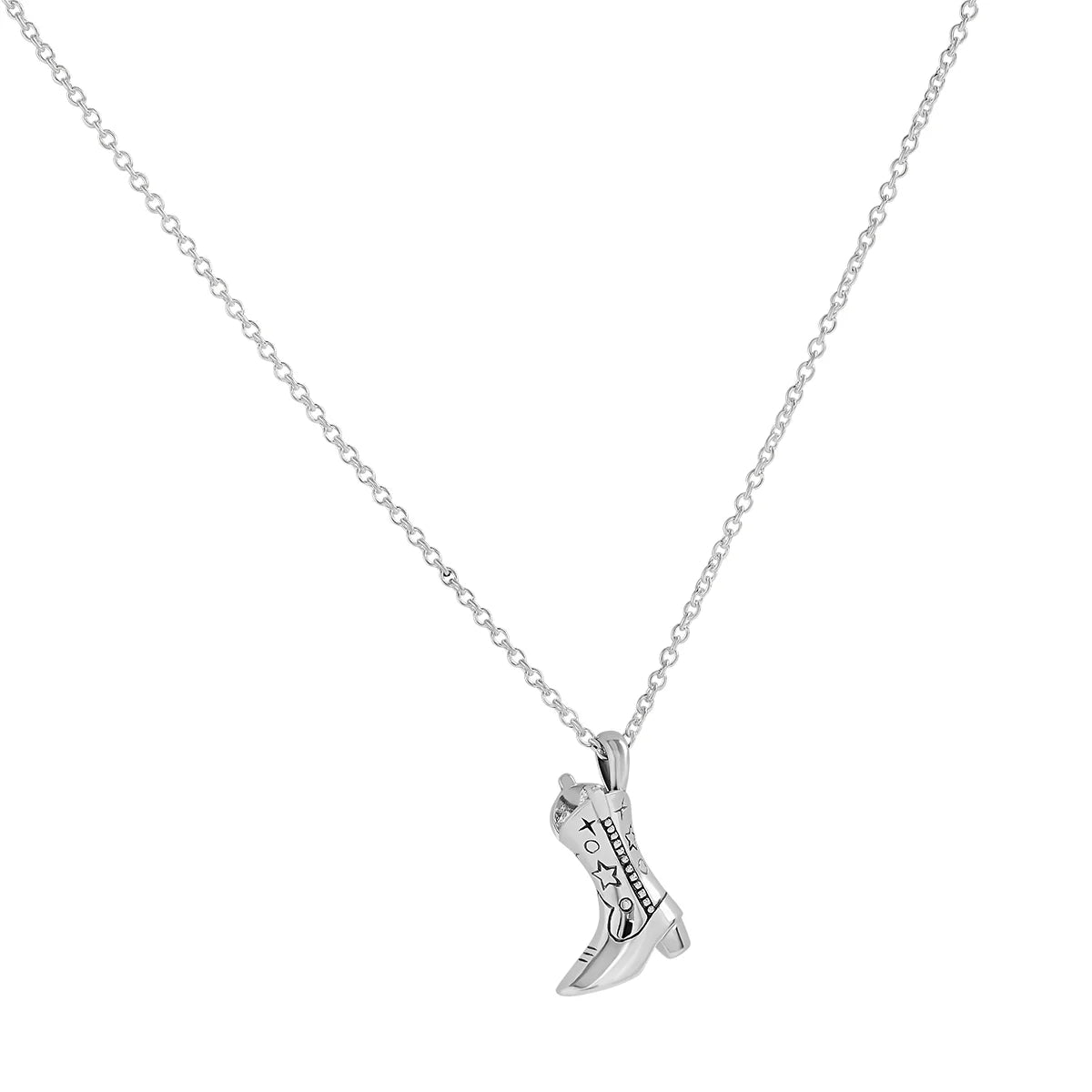 Silver cowgirl boot pendant on a chain against a white background