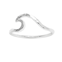 Silver wave-shaped ring on a white background