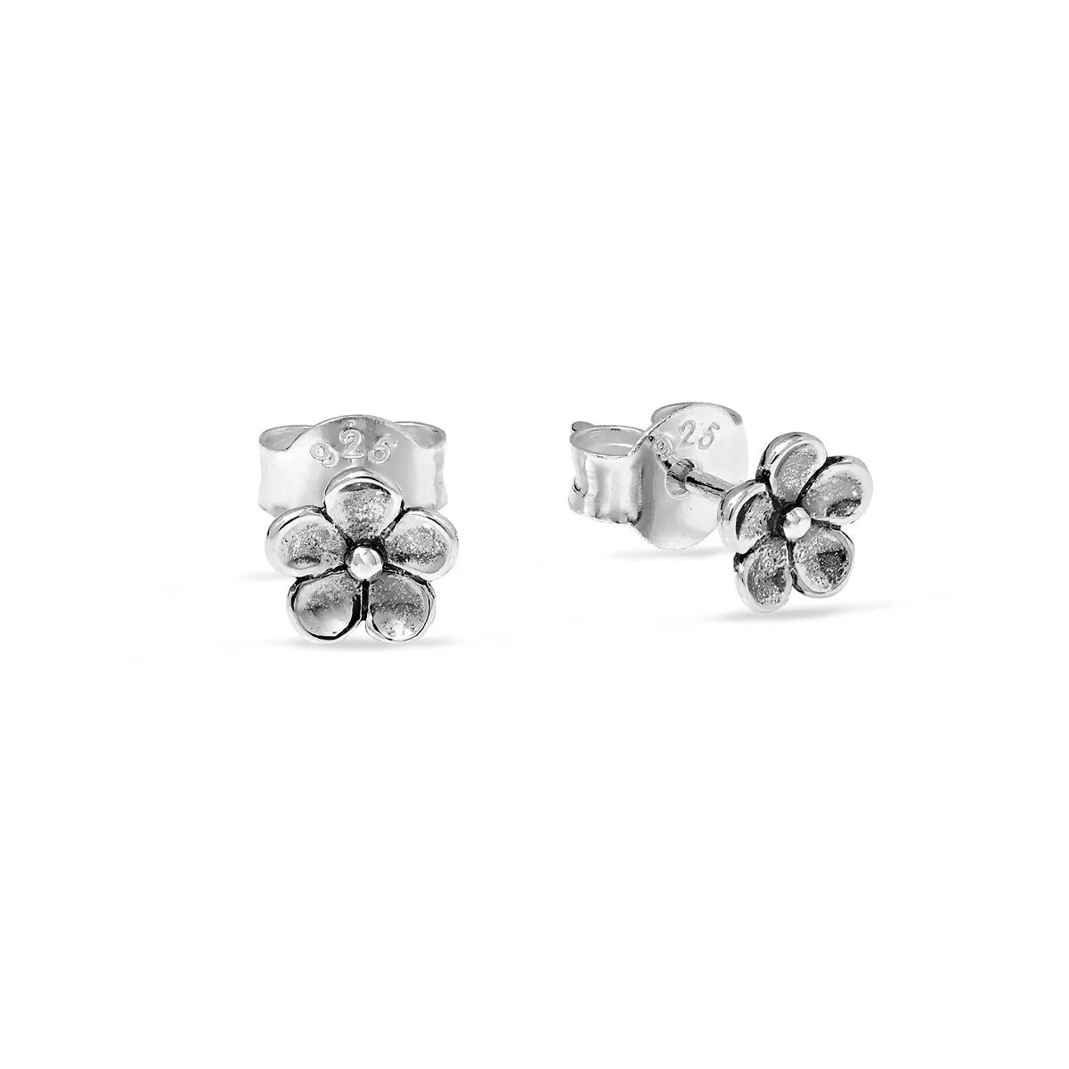 Silver flower-shaped earrings on a white background